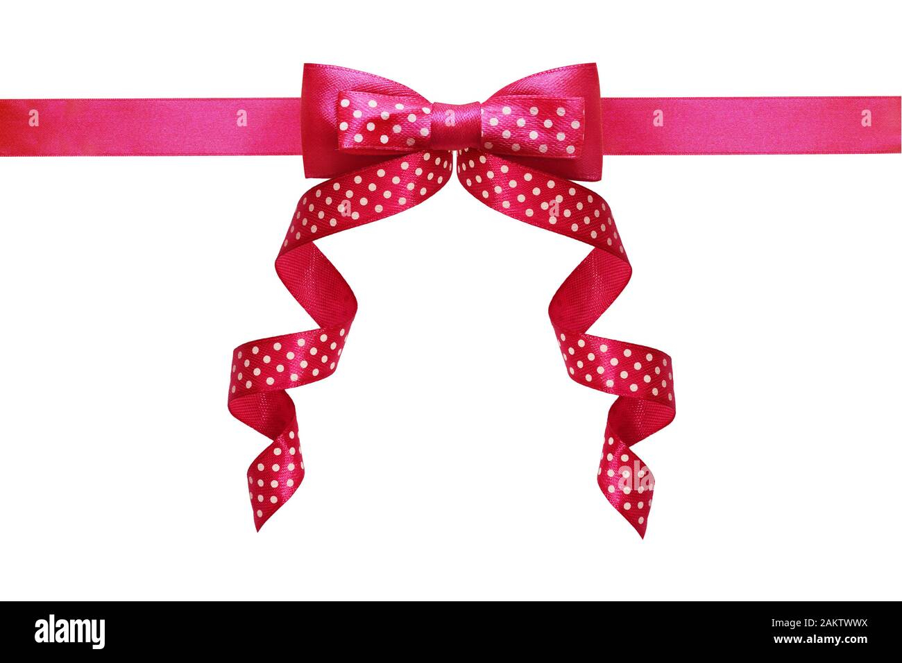 Pink silk polka dot ribbon bow isolated on white Stock Photo Alamy