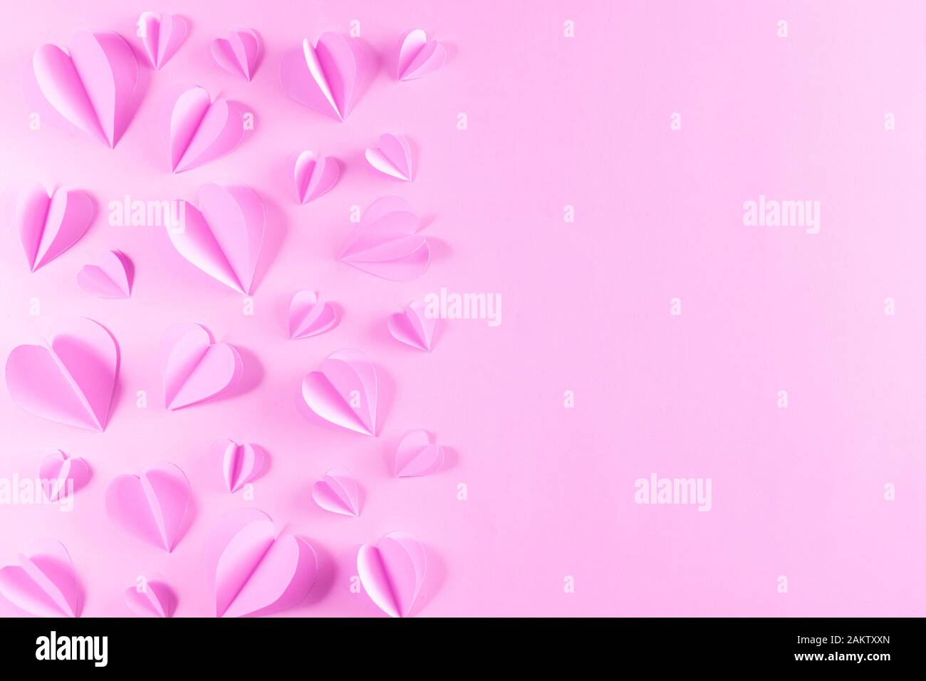 Pink hearts on pastel pink paper background. Background for Valentines ...