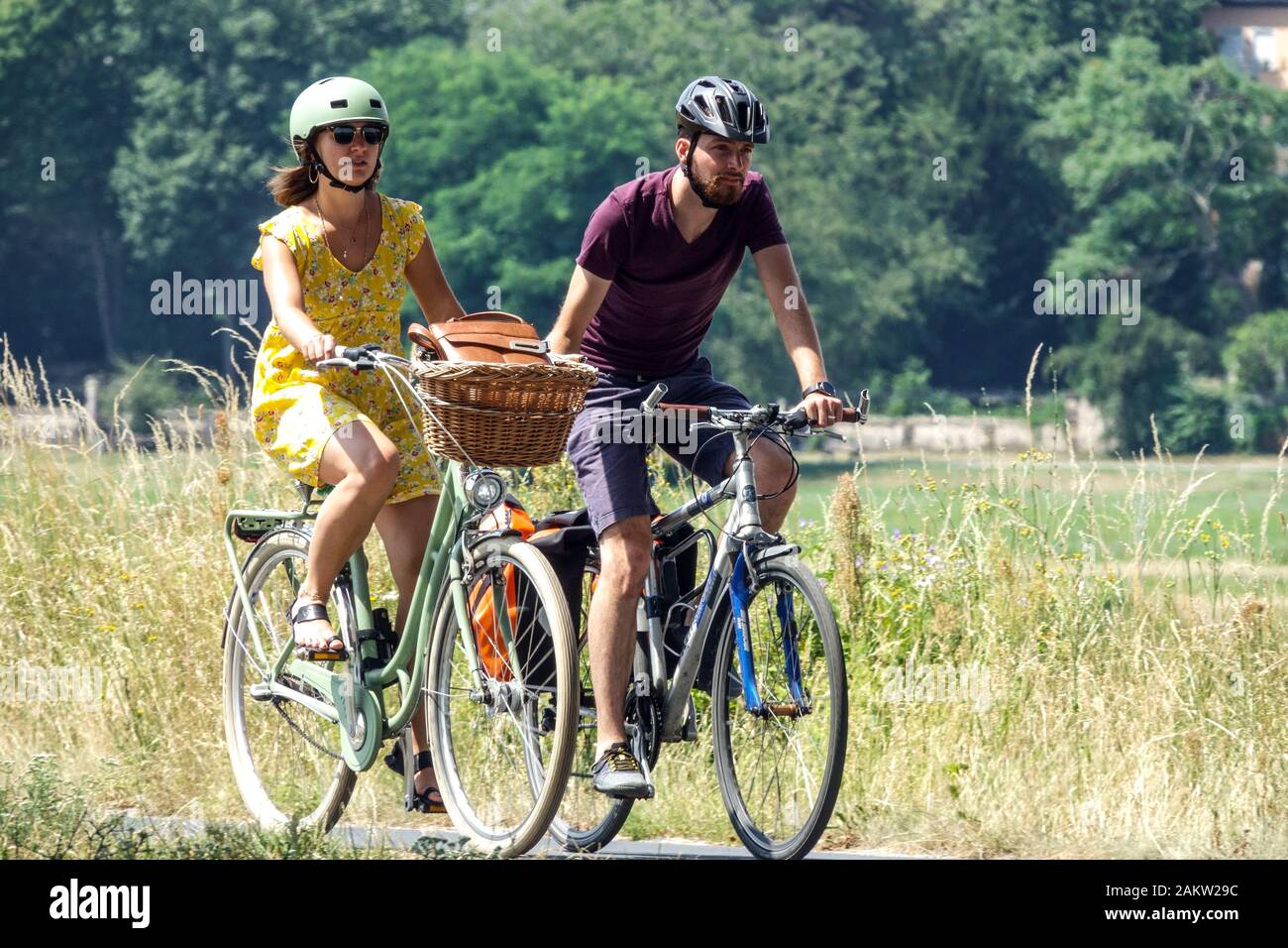 Germany lifestyle couple vacation on bicycle footpath Well-Being Stock Photo