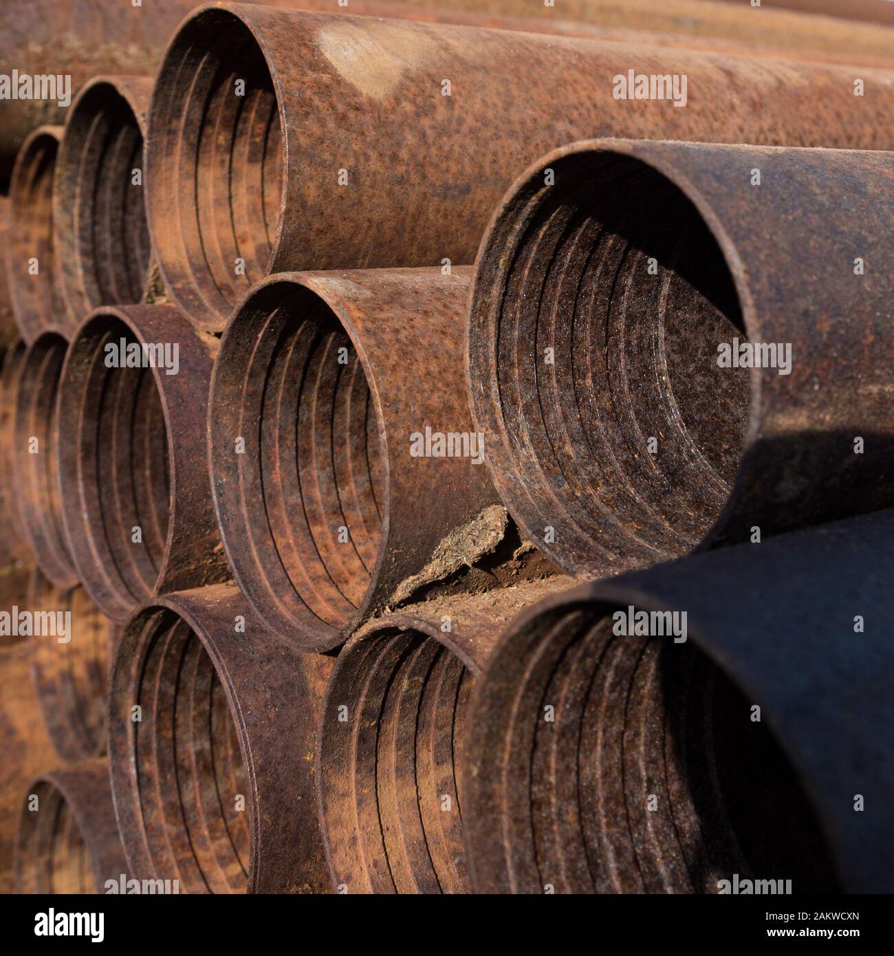 Metallic background of rusted pipes Stock Photo - Alamy