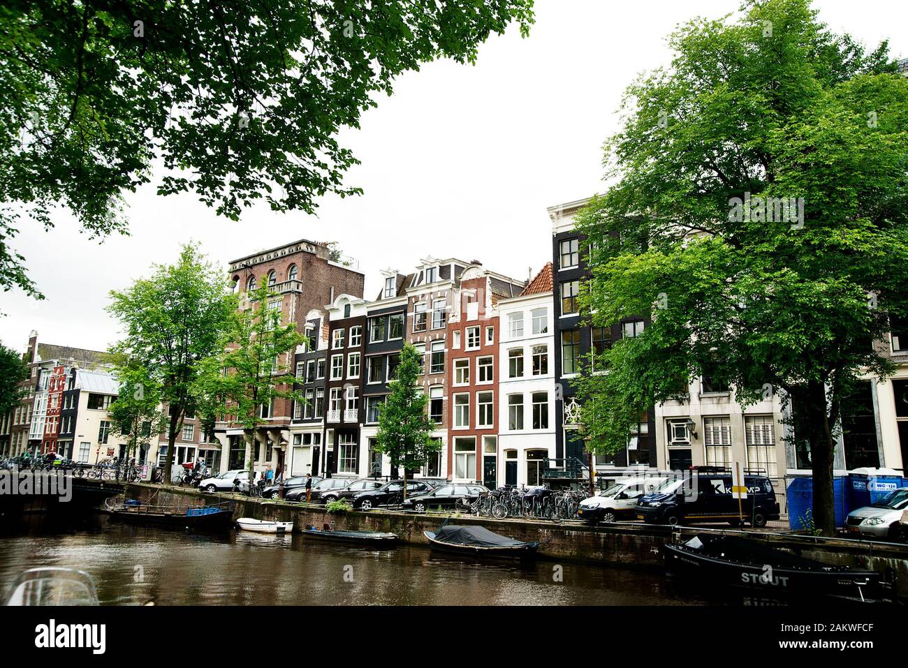 Amsterdam Canal side showing traditional canal side houses Stock Photo