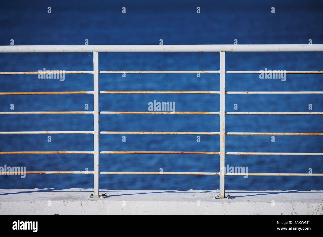 Fencing on the river embankment. Iron railing to protect and support ...