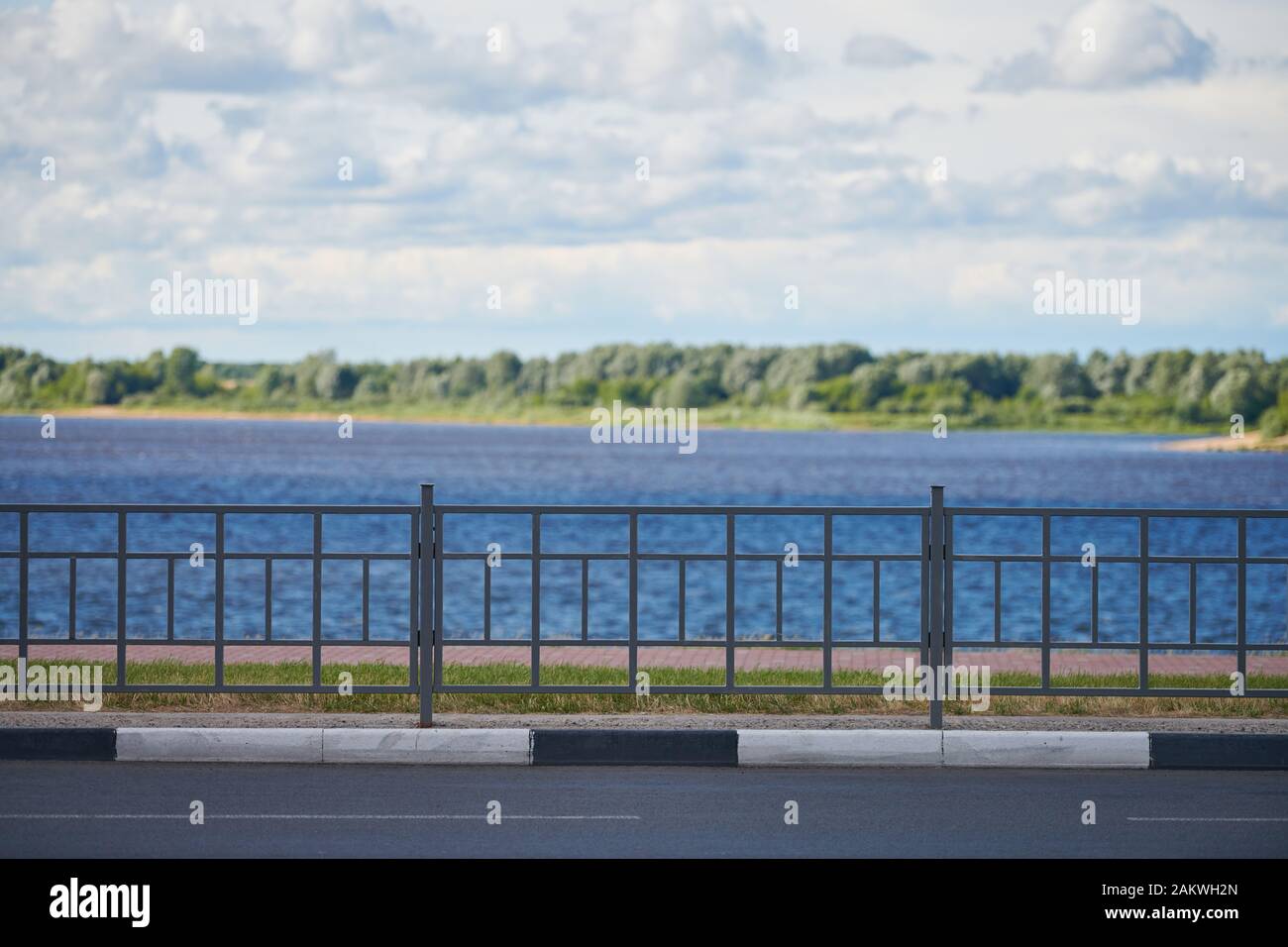 Fencing on the river embankment. Iron railing to protect and support ...