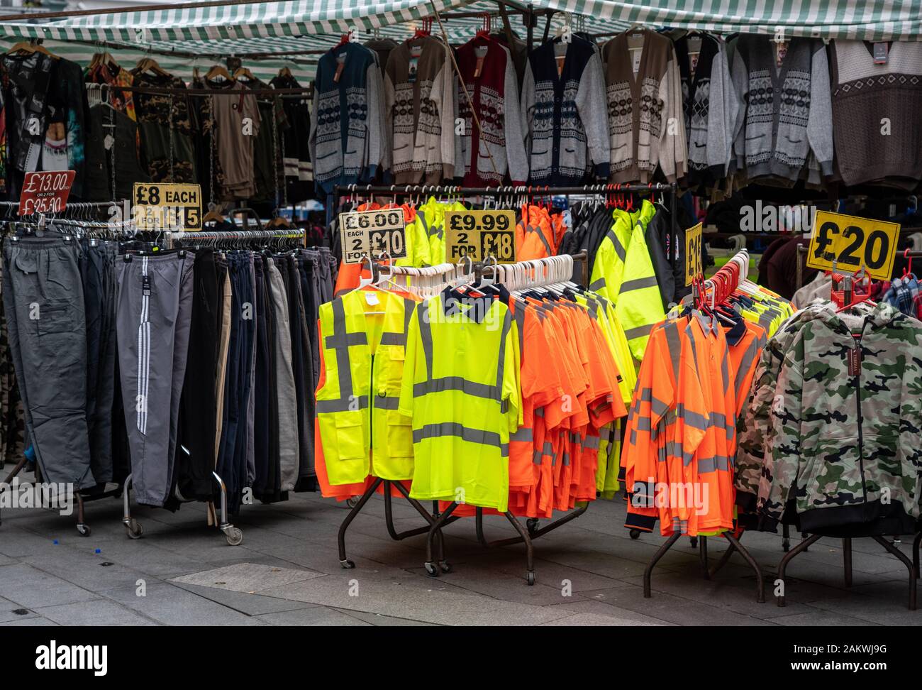 Woolwich, UK - 4 October 2019: Work clothes and jackets at clothing market stall in East London Stock Photo