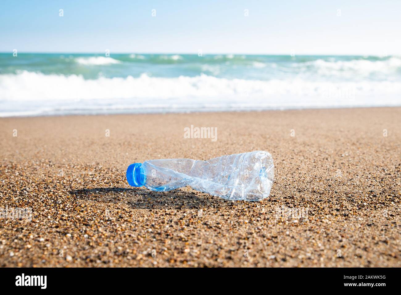 Plastic Pollution In Sea. Plastic Bottle On Sea Shore Stock Photo Alamy