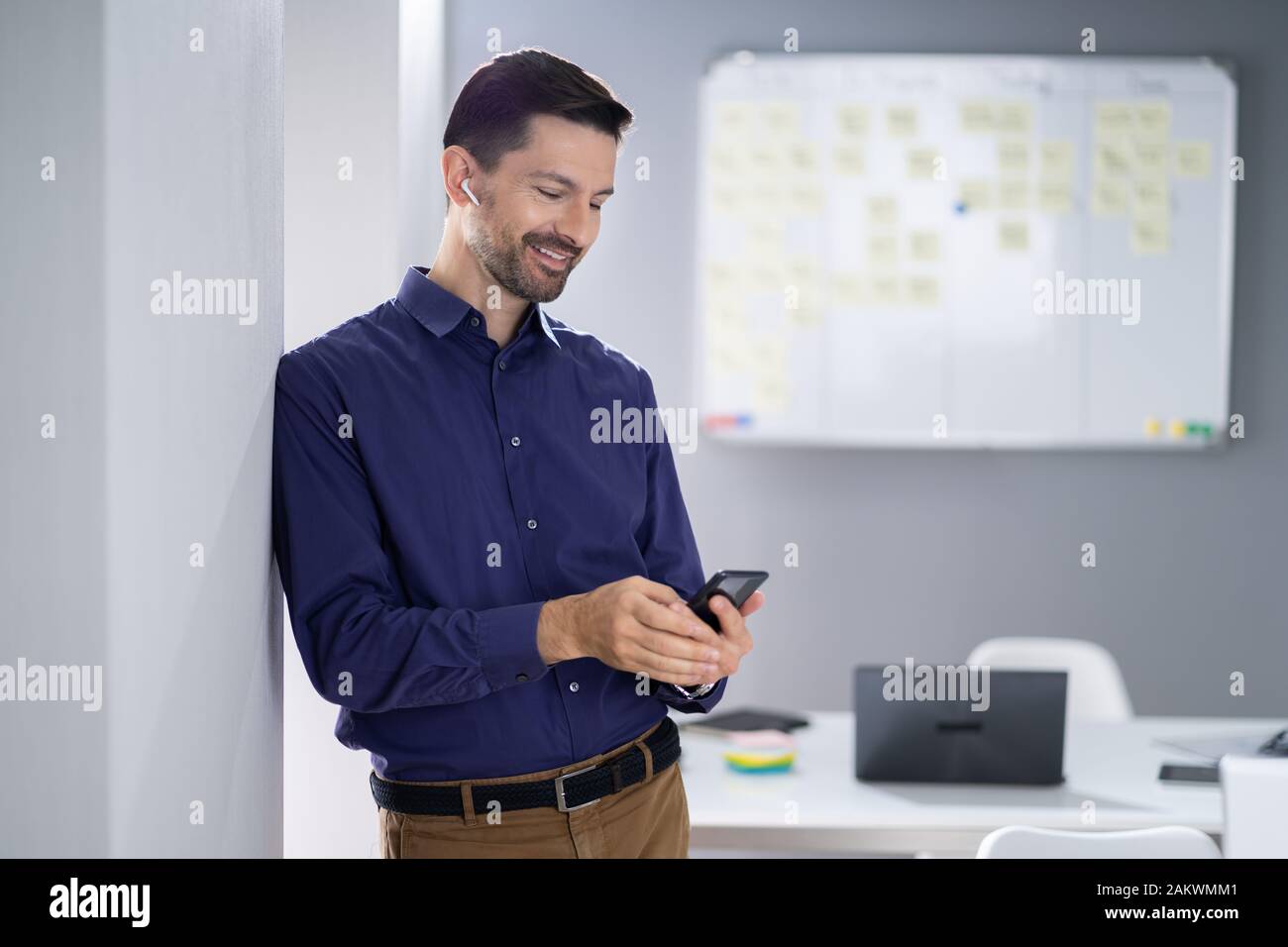 Portrait businessman earphones using hi res stock photography and Portrait businessman earphones using hi res stock photography and