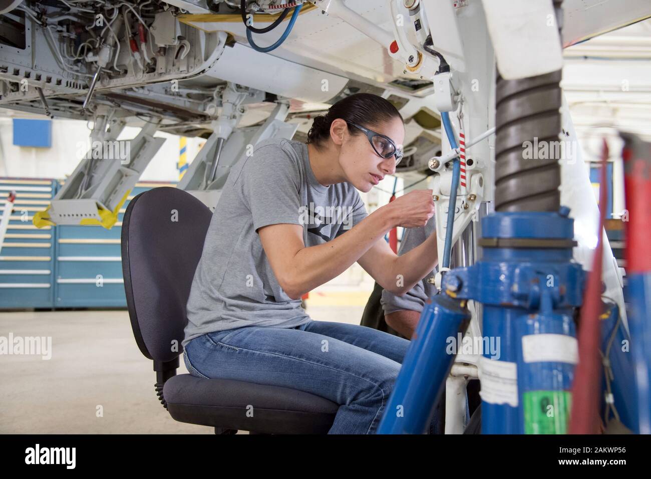 2017 NASA astronaut candidate Jasmin Moghbeli during T-38 engine maintenance training at Ellington Field in Houston on April 09, 2018. NASA is honoring the first class of astronaut candidates to graduate under the Artemis program on January 10, 2019, at the agency's Johnson Space Center in Houston. After completing more than two years of basic training, these candidates will become eligible for spaceflight, including assignments to the International Space Station, Artemis missions to the Moon, and, ultimately, missions to Mars. Stock Photo