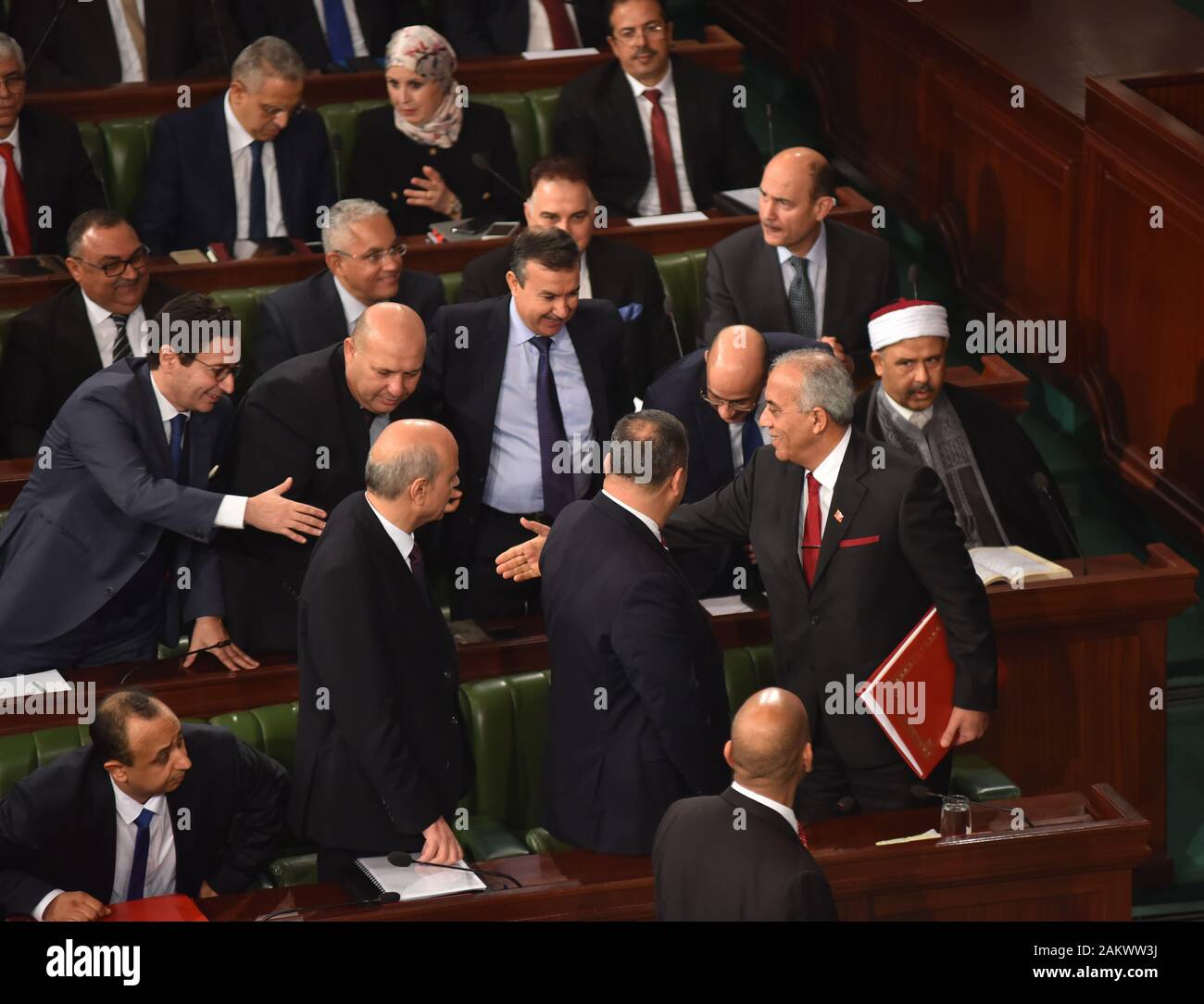 Parliamentarians during a parliament plenary session for a confidence vote on a proposed cabinet line-up. Tunisia's Prime Minister-designate, Habib Jemli unveiled a proposed government composed of independent figures after months of negotiations between political parties to fill positions failed. The cabinet of 28 ministers most of whom are unknown to the general public, including four women, needs to receive parliamentary assent. Stock Photo