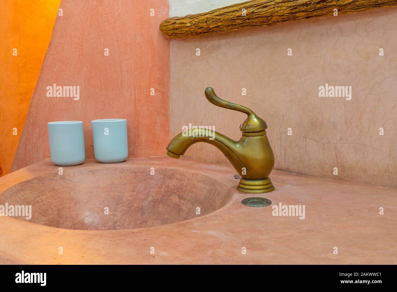 A rustic bathroom sink and tap in Trinidad, Cuba, Caribbean Stock Photo