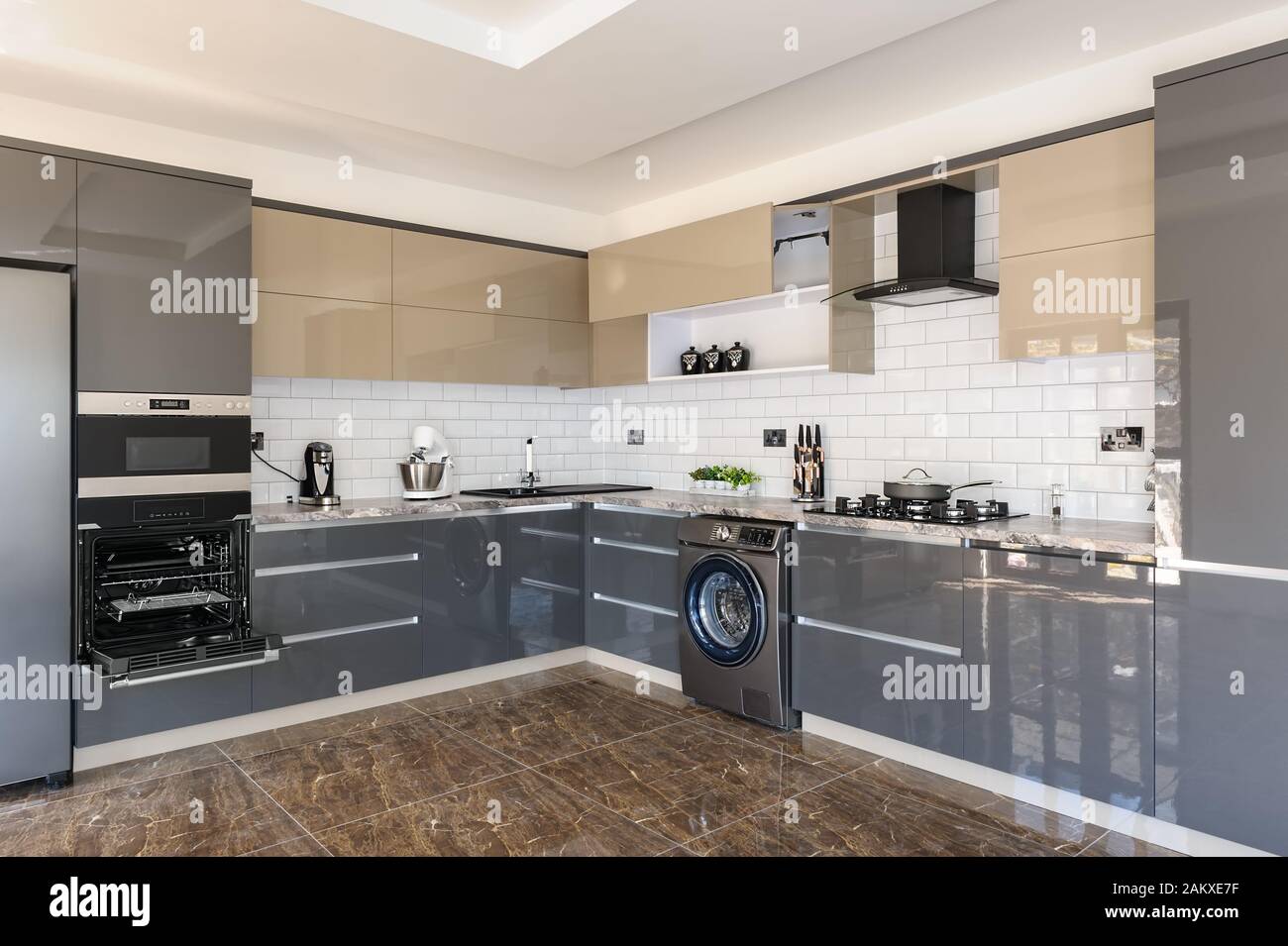 Luxury modern white, beige and grey kitchen interior Stock Photo - Alamy