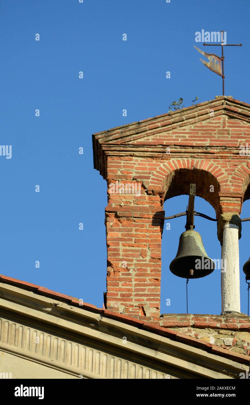ancient bell tower against the blue sky background Stock Photo