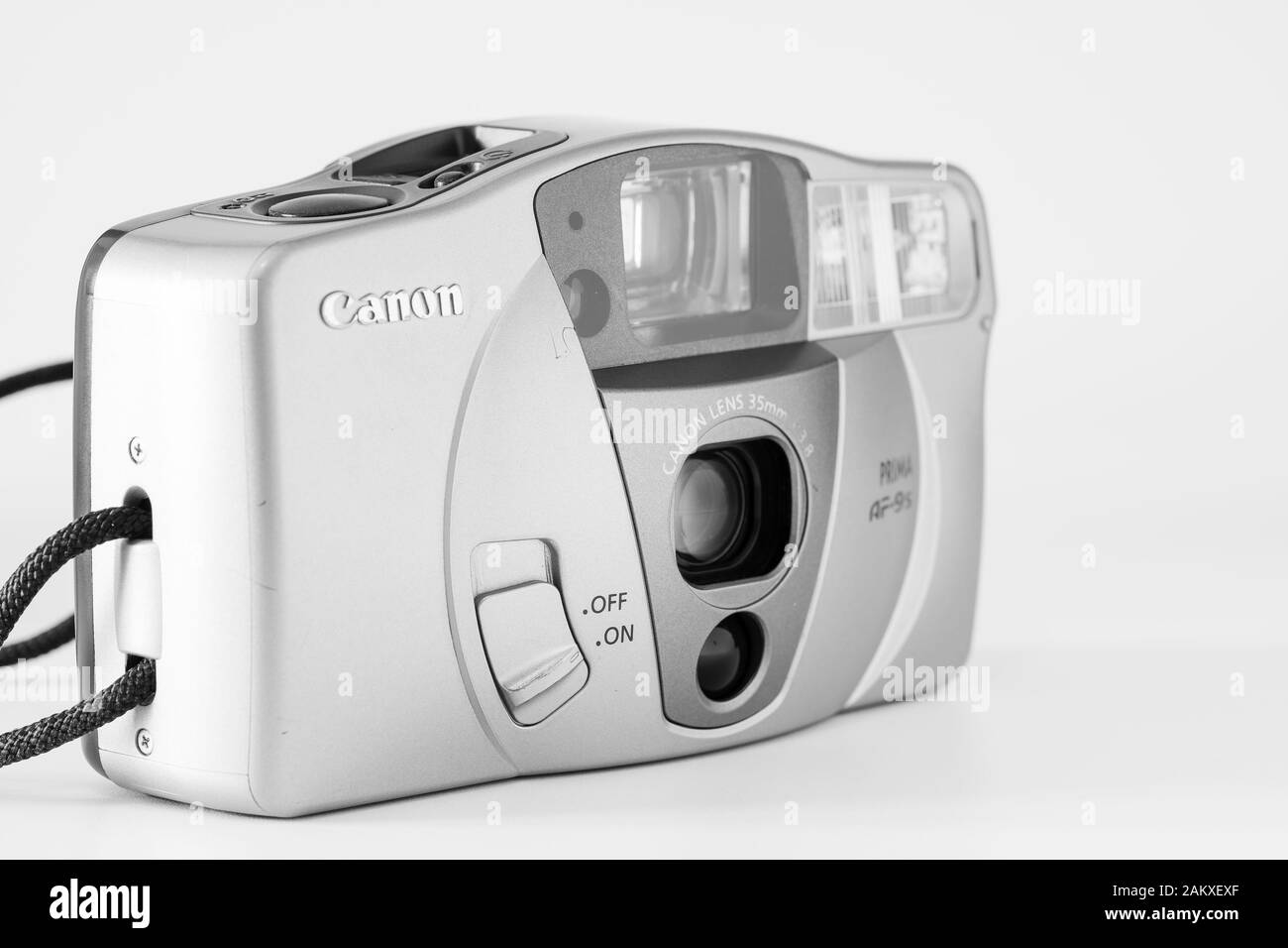 Angular view of a compact analog camera, 35mm system, Canon brand, 'Af9 Prima' model, monochrome image. Stock Photo