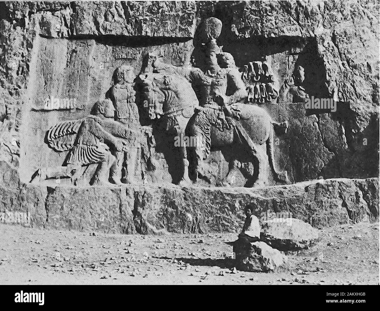 Persia past and present; a book of travel and research, with more than two hundred illustrations and a map . ^ .%*#i^ *.* First Sasanian Sciilptuhe at Naksh-i Rustam. Fourth Sasanian Sculpture at Naksh-i Rustam SEVEN SASANIAN SCULPTURES 301 bear Sasanian bas-reliefs of the third and fourth centuries of theChristian era. If we adopt the same order of enumeration fromeast to west as for the tombs, we may describe the first bas-relief as located between the first and second sepulchre andadjoining a large incised space that is vacant, except for threerectangular holes and an unimportant modern Per Stock Photo