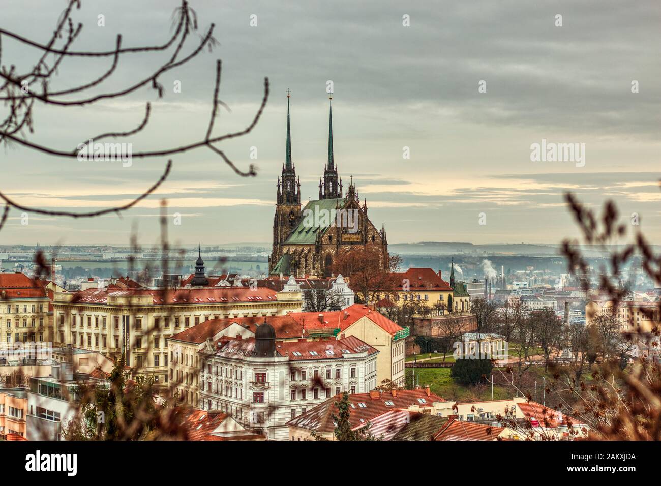 Brno Czech Republic January 10 of 2020 - Cathedral of St. Peter and Paul under autumn clouds with light snow on houses buildings on beautiful sunset Stock Photo