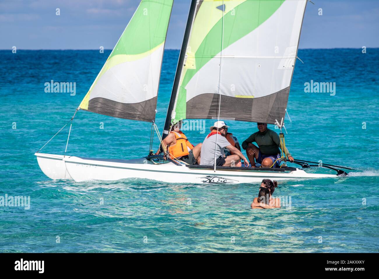 A small catamaran sailing at the beach , Havana, Cuba Stock Photo