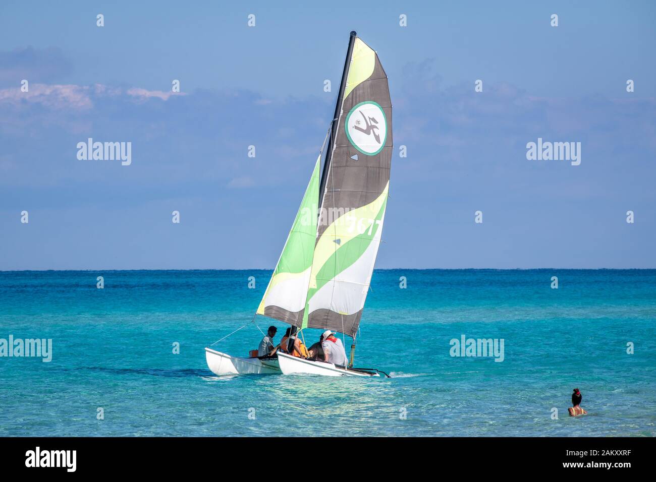 A small catamaran sailing at the beach , Havana, Cuba Stock Photo
