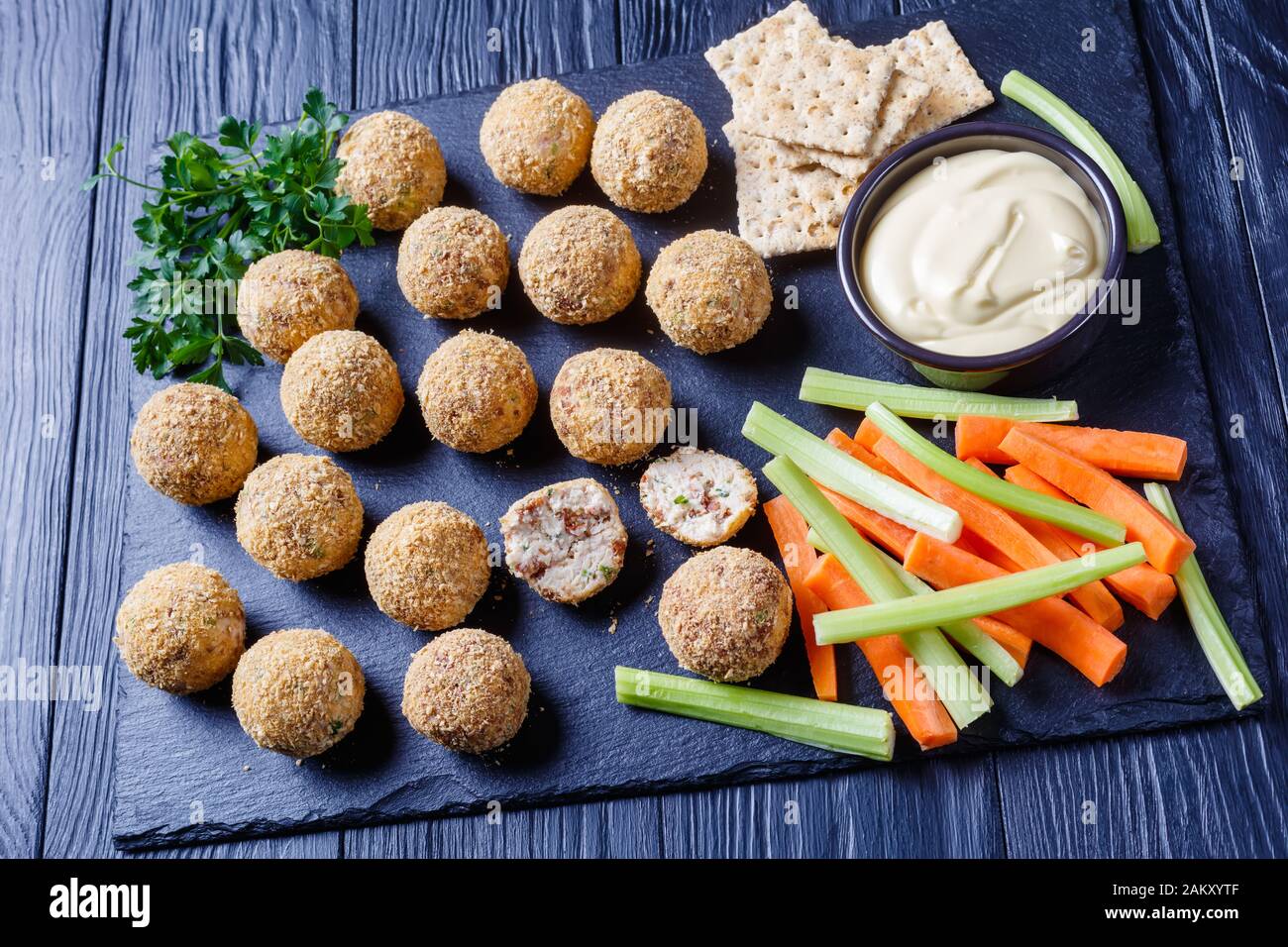 cheese balls made with cream cheese, deviled ham, cheddar cheese and