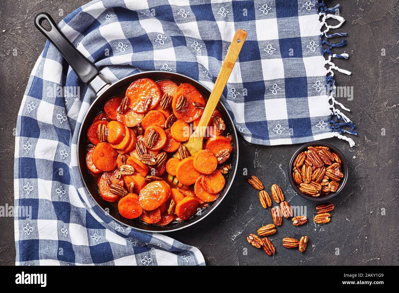 Candied sweet potatoes with brown sugar, maple syrup, orange juice and