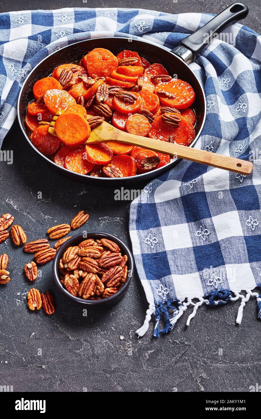 Candied sweet potatoes with brown sugar, maple syrup, orange juice and