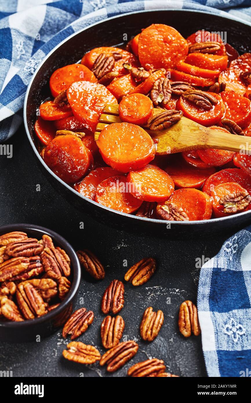 closeup of Candied sweet potatoes with brown sugar, maple syrup