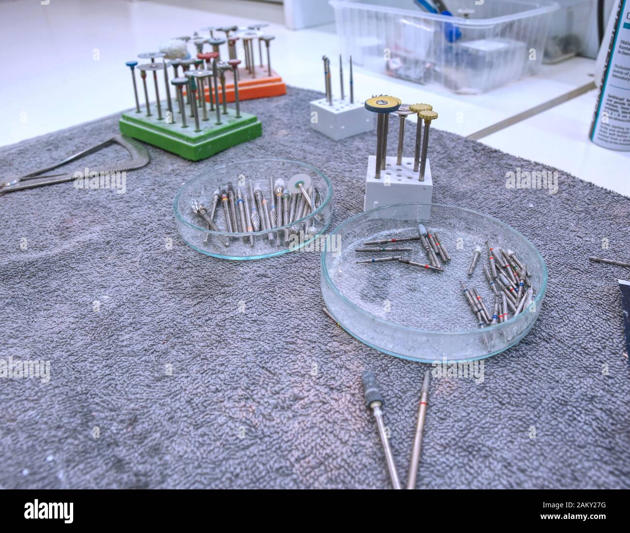 Dental diamond milling cutter on table. Dental bur set, dentist