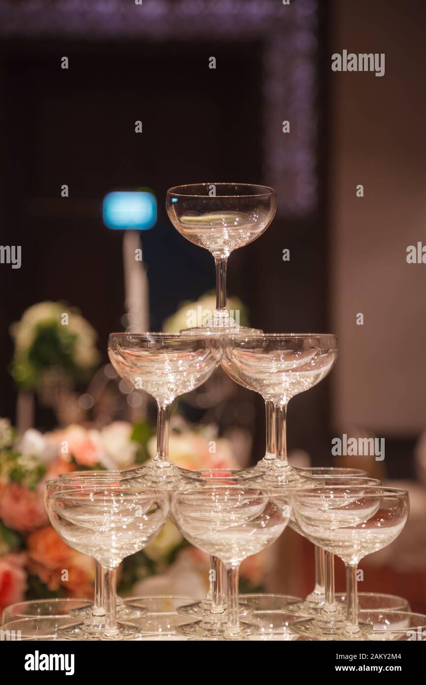 https://c8.alamy.com/comp/2AKY2M4/champagne-glass-tower-symbol-of-sweet-love-arrangement-in-wedding-ceremony-wedding-ceremony-reception-tools-and-decoration-event-organizing-weddi-2AKY2M4.jpg