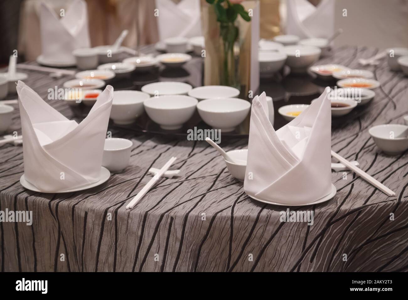 VIP dining table with cutlery and napkin settings Stock Photo - Alamy