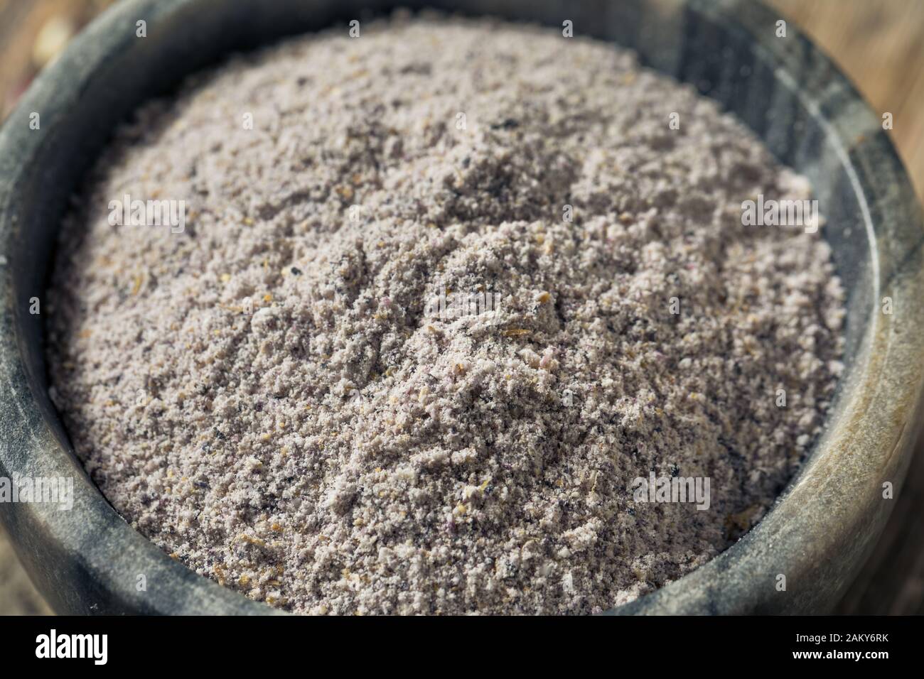Raw Blue Organic Cornmeal Flour in a Bowl Stock Photo Alamy