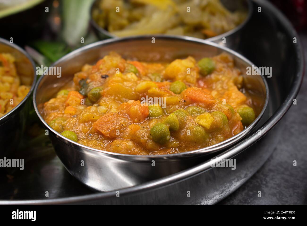 Indian mixed vegetable curry in tiny serving bowl Stock Photo Alamy