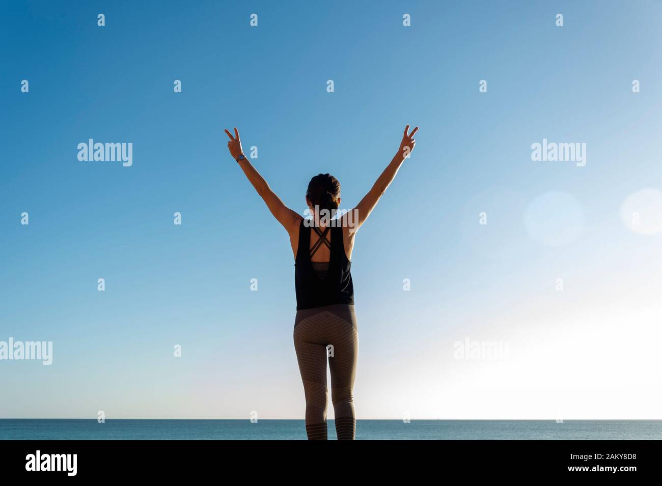 Celebrating arms raised hi-res stock photography and images - Alamy
