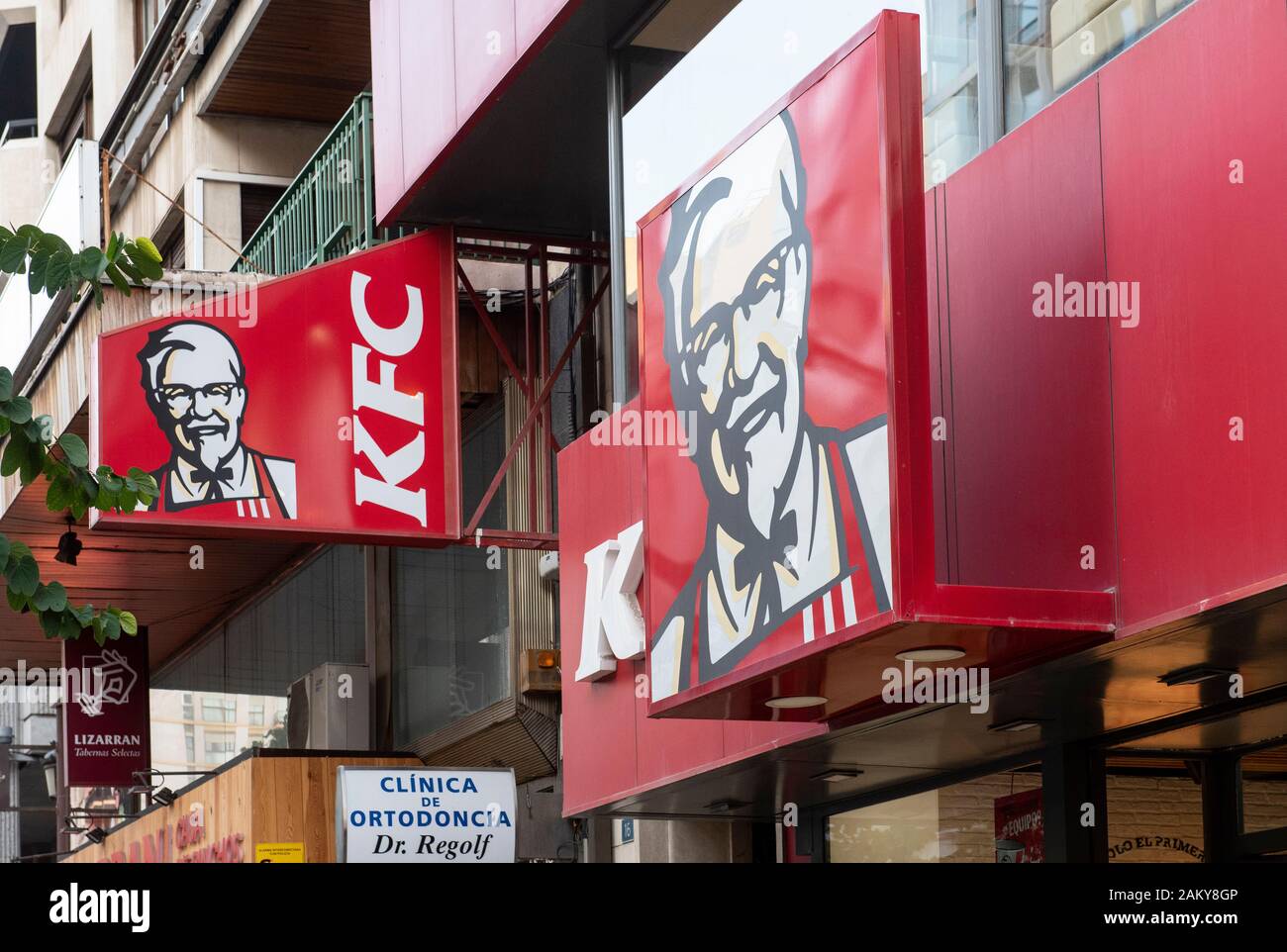 American fast food chicken restaurant chain Kentucky Fried Chicken KFC restaurant and logo seen in Spain. Stock Photo