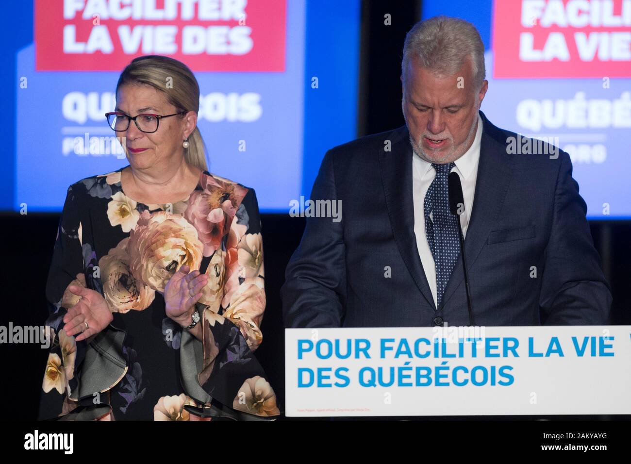 Quebec Premier Philippe Couillard, sided by his wife Suzanne Pilote, reacts as he concedes the 2018 Quebec Provincial election to the Coalition Avenir Quebec in Saguenay Monday October 1, 2018. Stock Photo