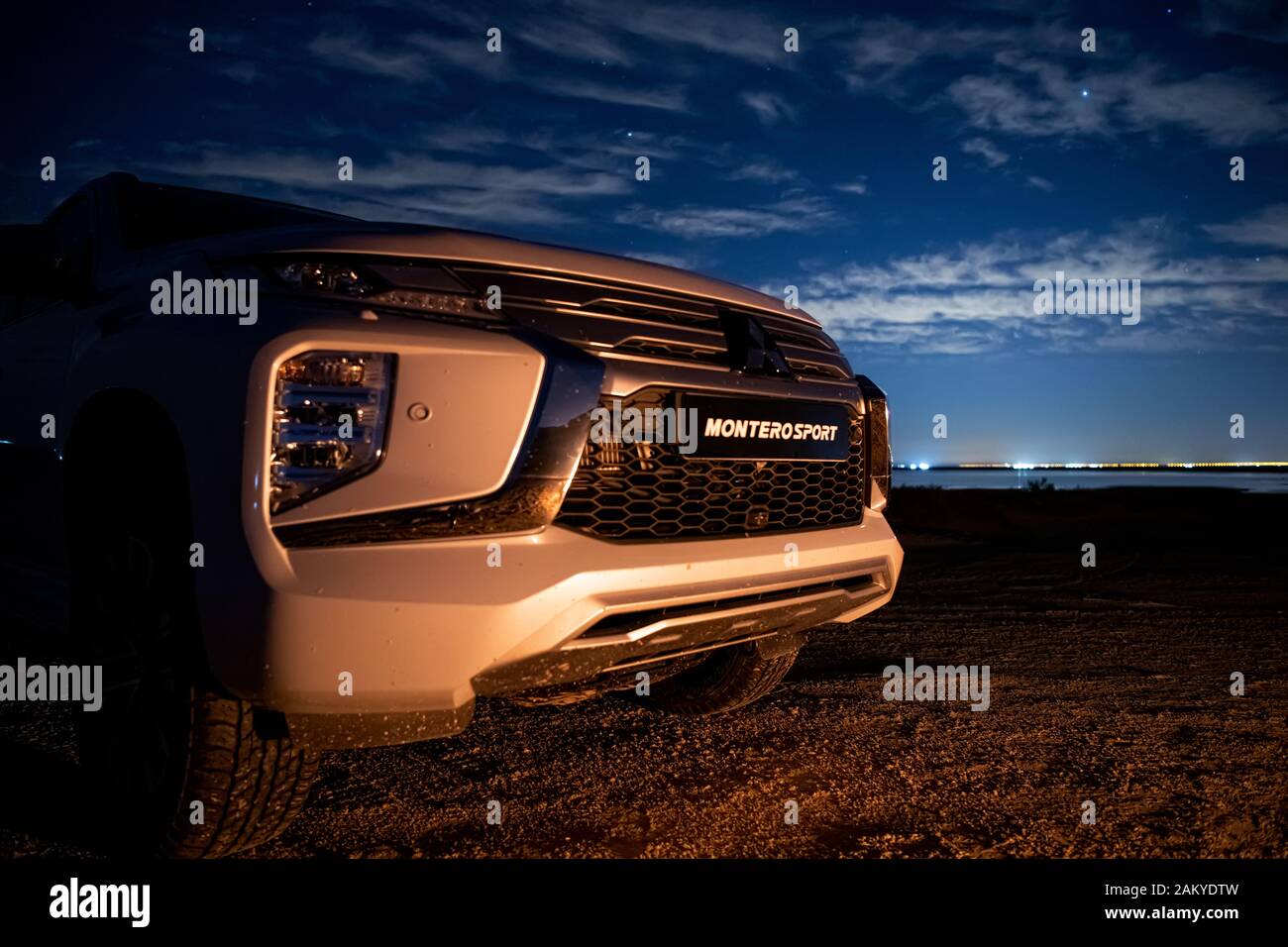 Mitsubishi Montero Sport suv 4x4  urban vehicle front view. camping in desert Stock Photo