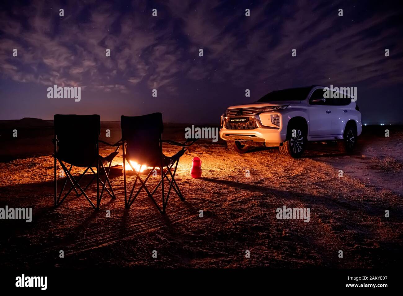 Mitsubishi Montero Sport suv 4x4  urban vehicle front view. camping in desert Stock Photo