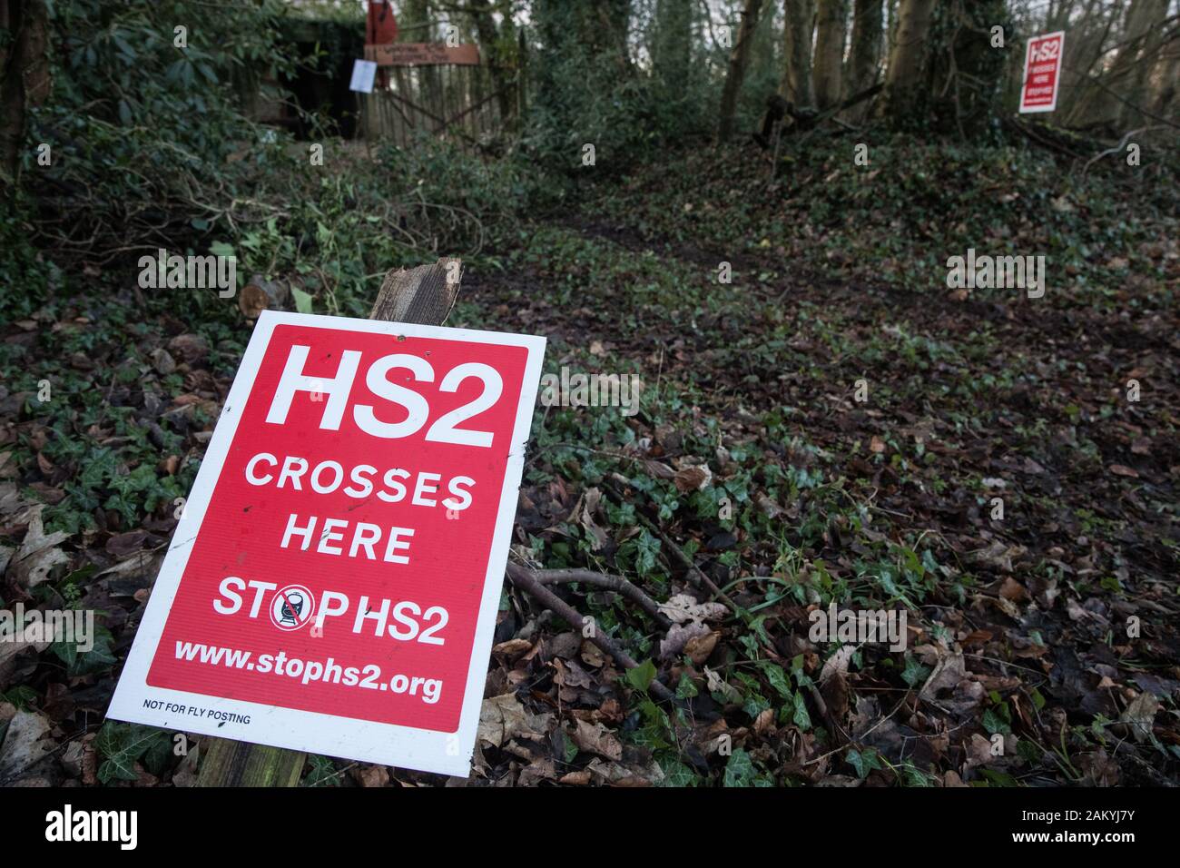 Wendover, UK. 10 January, 2020. Signs outside the newly-established Wendover Active Resistance Camp. Stop HS2 activists from around the UK established the camp in woodland outside Wendover on the proposed route for HS2 through the Chilterns AONB in response to requests for assistance from members of the local community opposed to the high speed rail link. The impact on the immediate area is expected to be even worse than initially expected, with not only two 500m viaducts and a 1km embankment to be built but also a Bentonite factory and 240-bed accommodation block. Credit: Mark Kerrison/Alamy Stock Photo