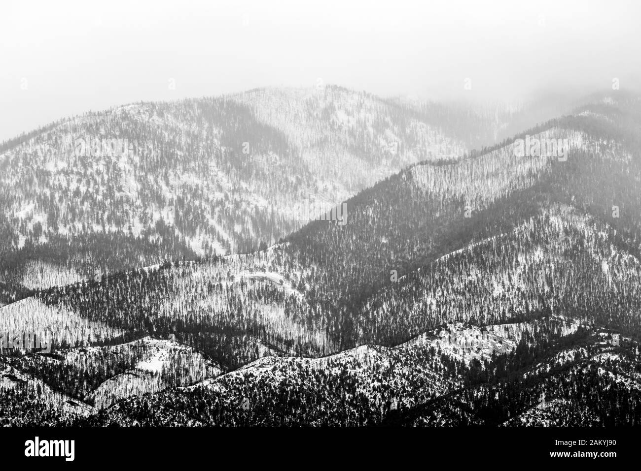 Black & white of cloudy winter view of snow covered Methodist Mountain; Sangre de Cristo Range; near Salida; Coloraod; USA Stock Photo
