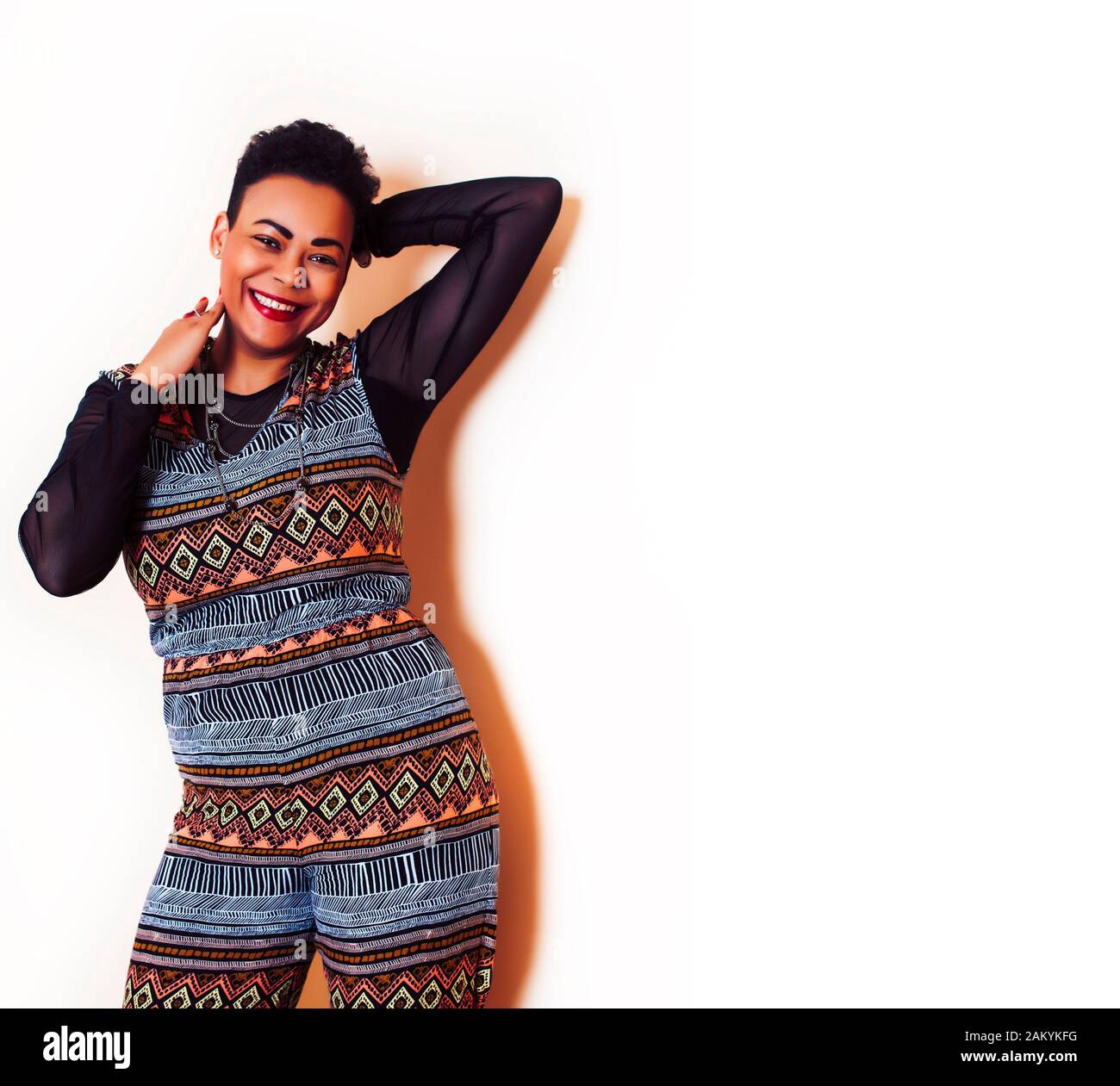 young pretty african american woman happy smiling posing against white ...