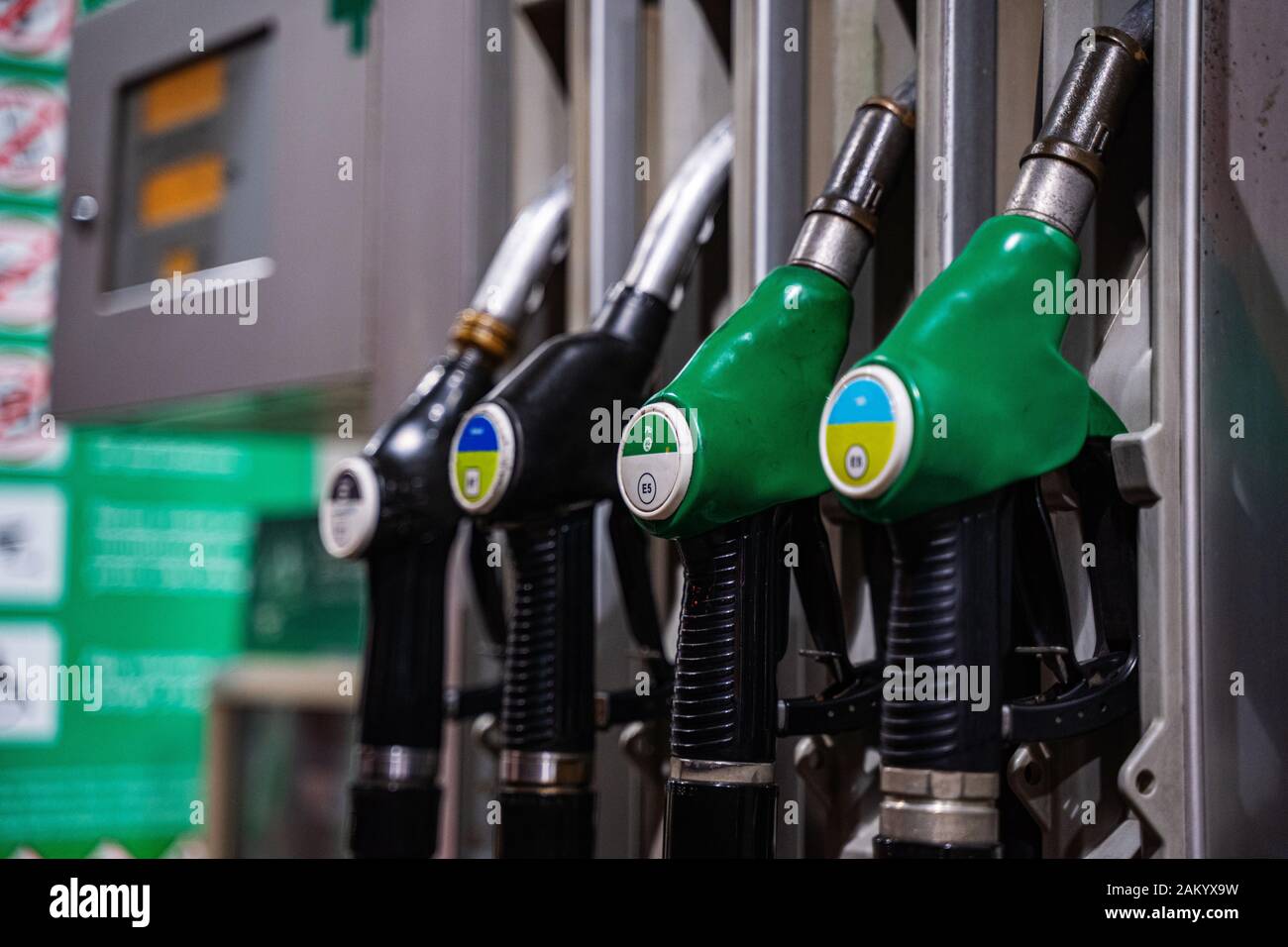 Gasoline and diesel distributor at the gas station. Gas pump nozzles