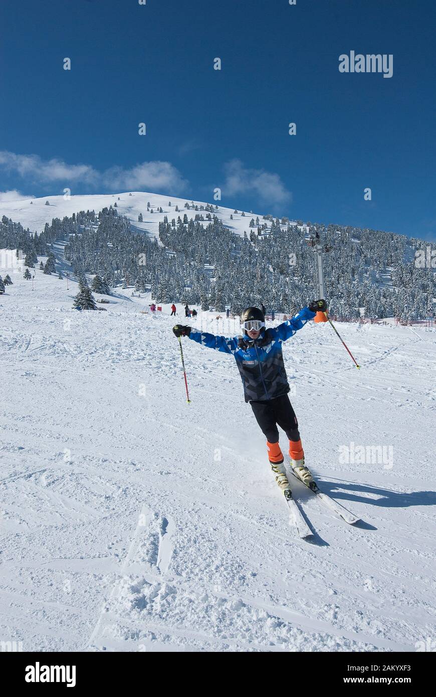 Skiers in the summit of Kalavrita ski center. Stock Photo