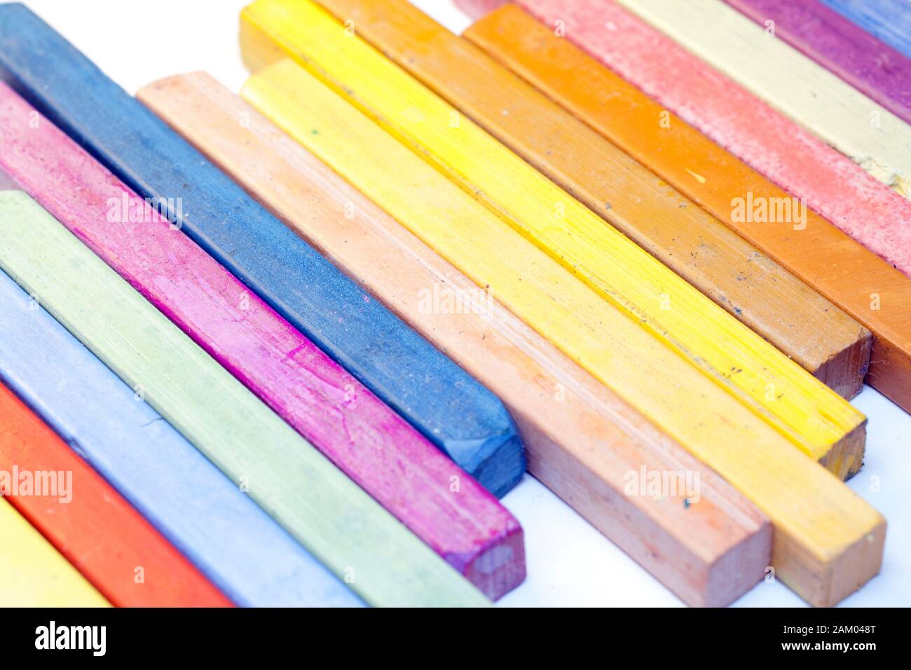 Colourful crayons on white background Stock Photo - Alamy