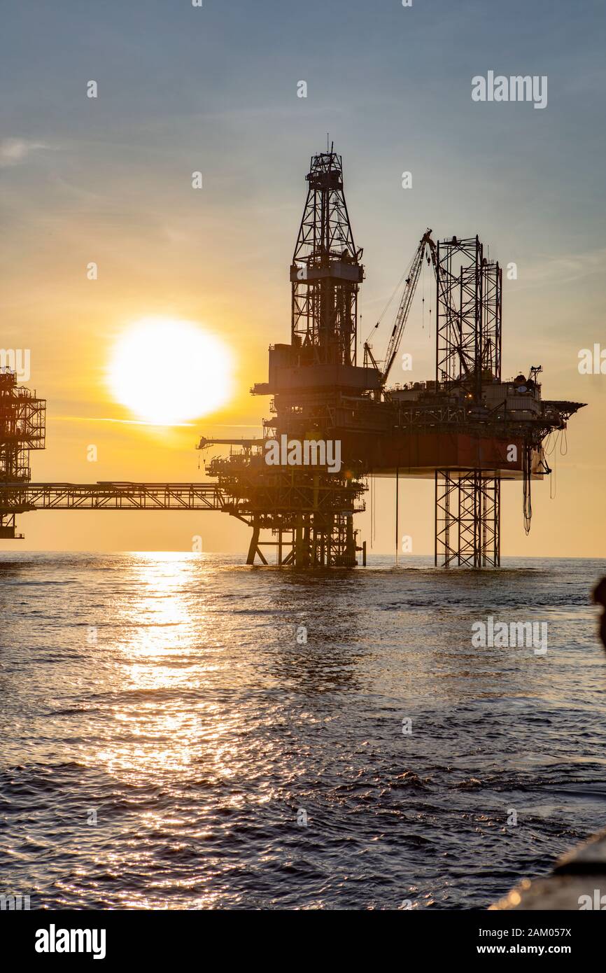 Offshore energy production during late afternoon Stock Photo