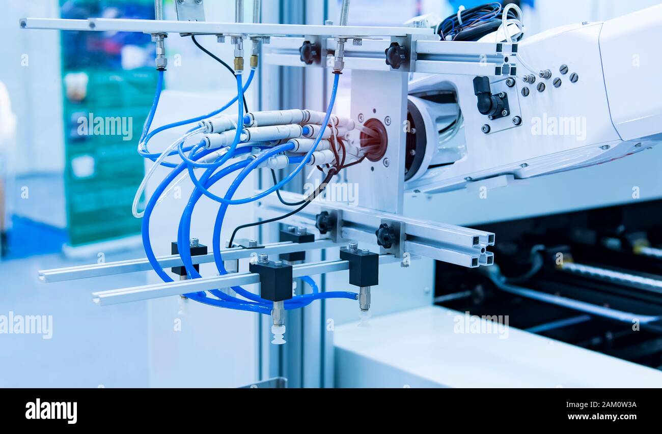 robot arm is working smartly in the production department in artificial intelligence factory Stock Photo