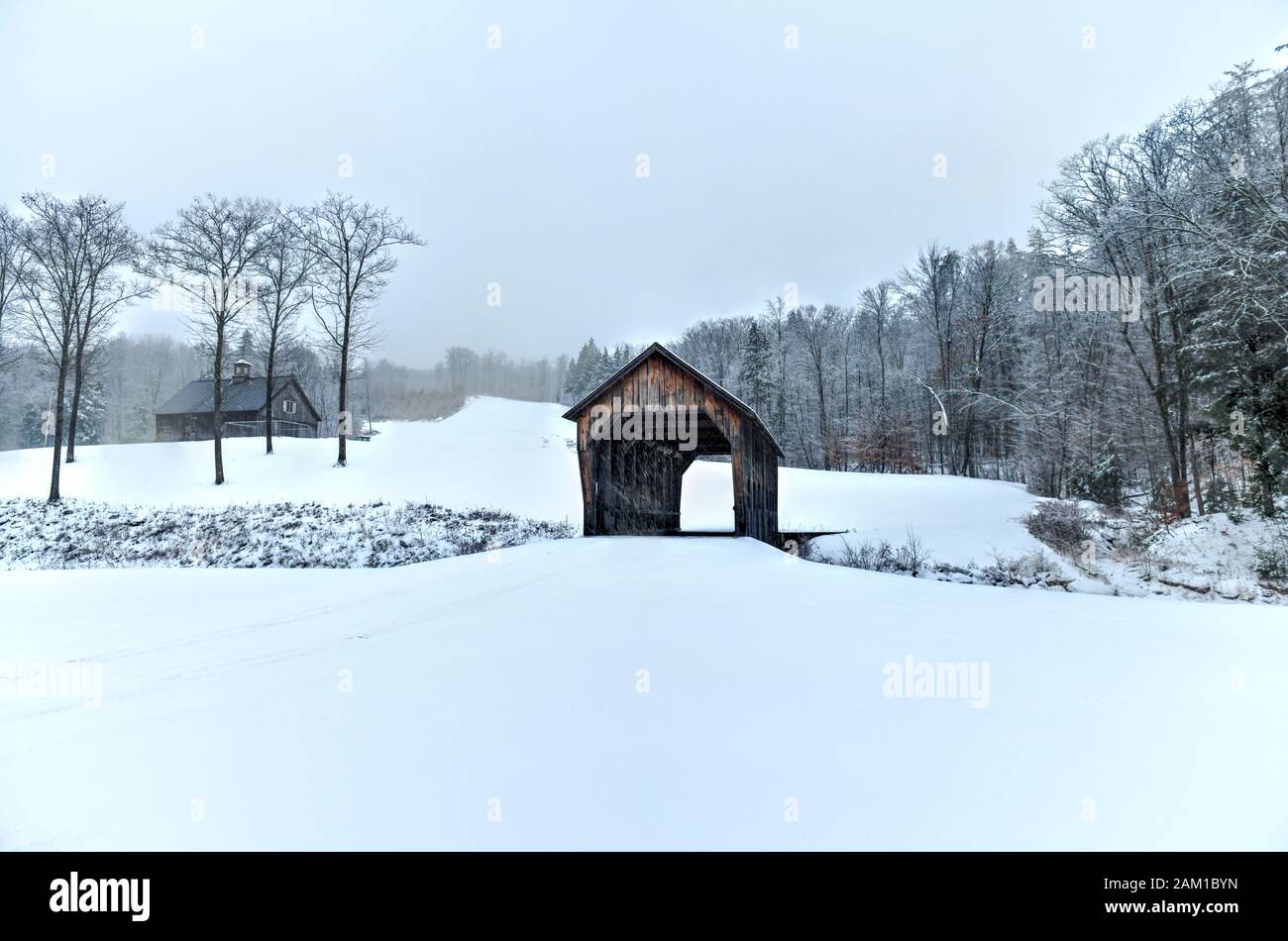 Mill Brook Covered Bridge in Hartland, Vermont during the winter. Stock Photo