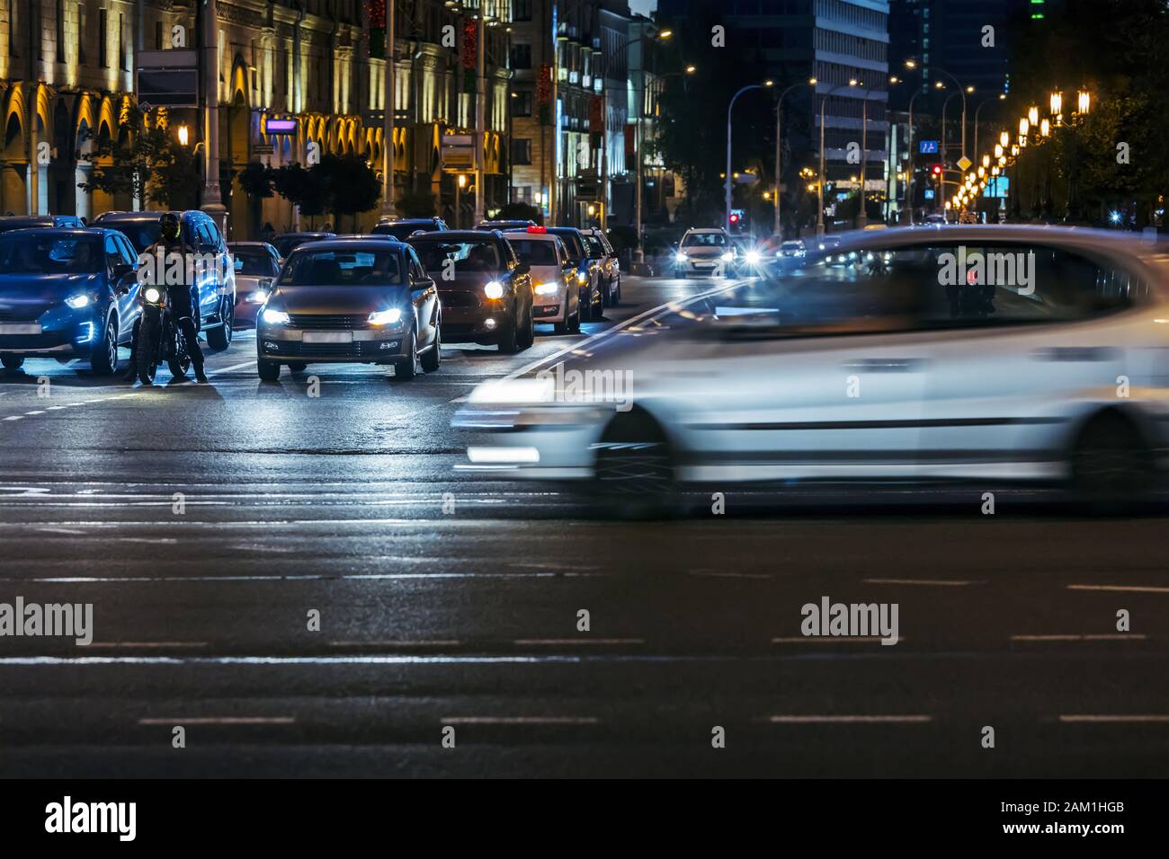 car traffic at night on the street. illuminated cityscape night view Stock Photo