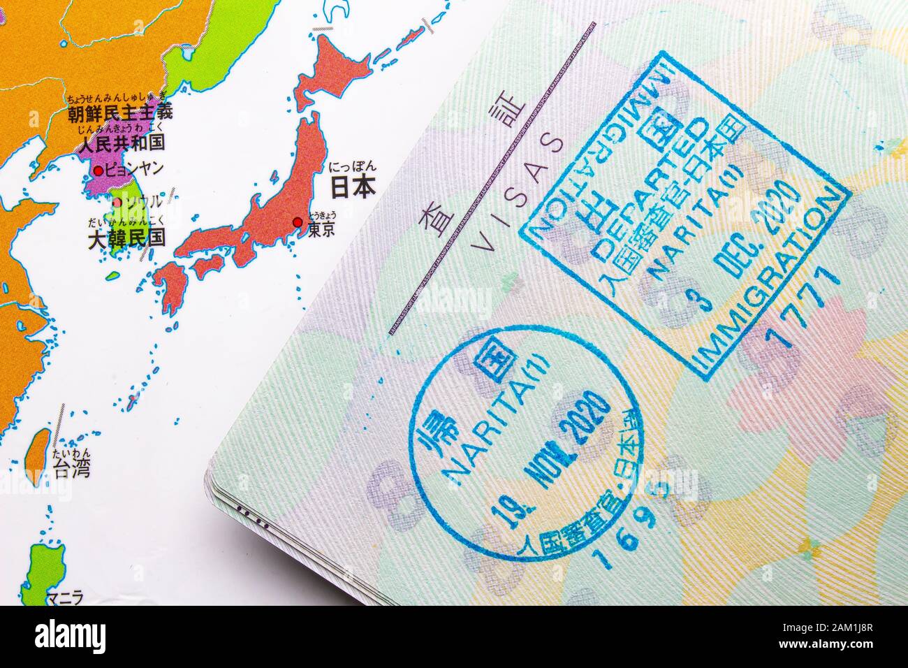 An Inside Page Of A Passport On A Entry Stamp To Japan With An Asian Map On The Background Stock Photo Alamy