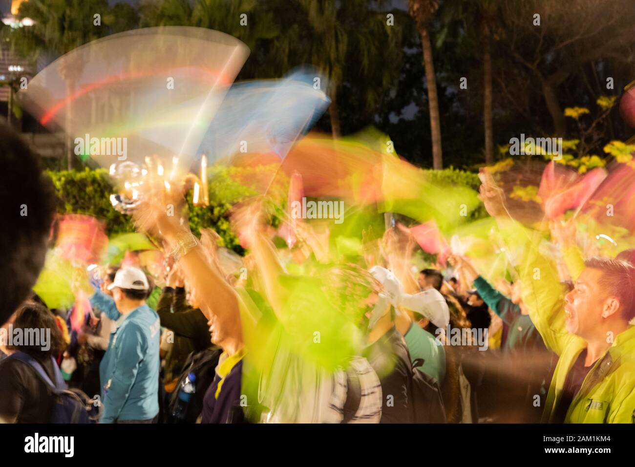 People cheer at Taiwan President Tsai Ing-wen’s Ketagalan Boulevard re-election rally on Jan. 10, 2020, the eve of Taiwan's 2020 presidential election. Taipei, Taiwan, January 10, 2020 by Perry Svensson Stock Photo