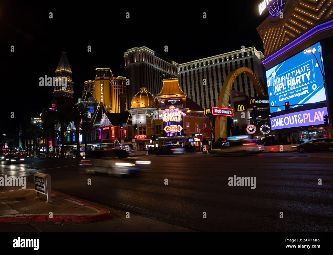 Las Vegas, Nevada, illuminated at night with traffic passing through along the strip. Stock Photo