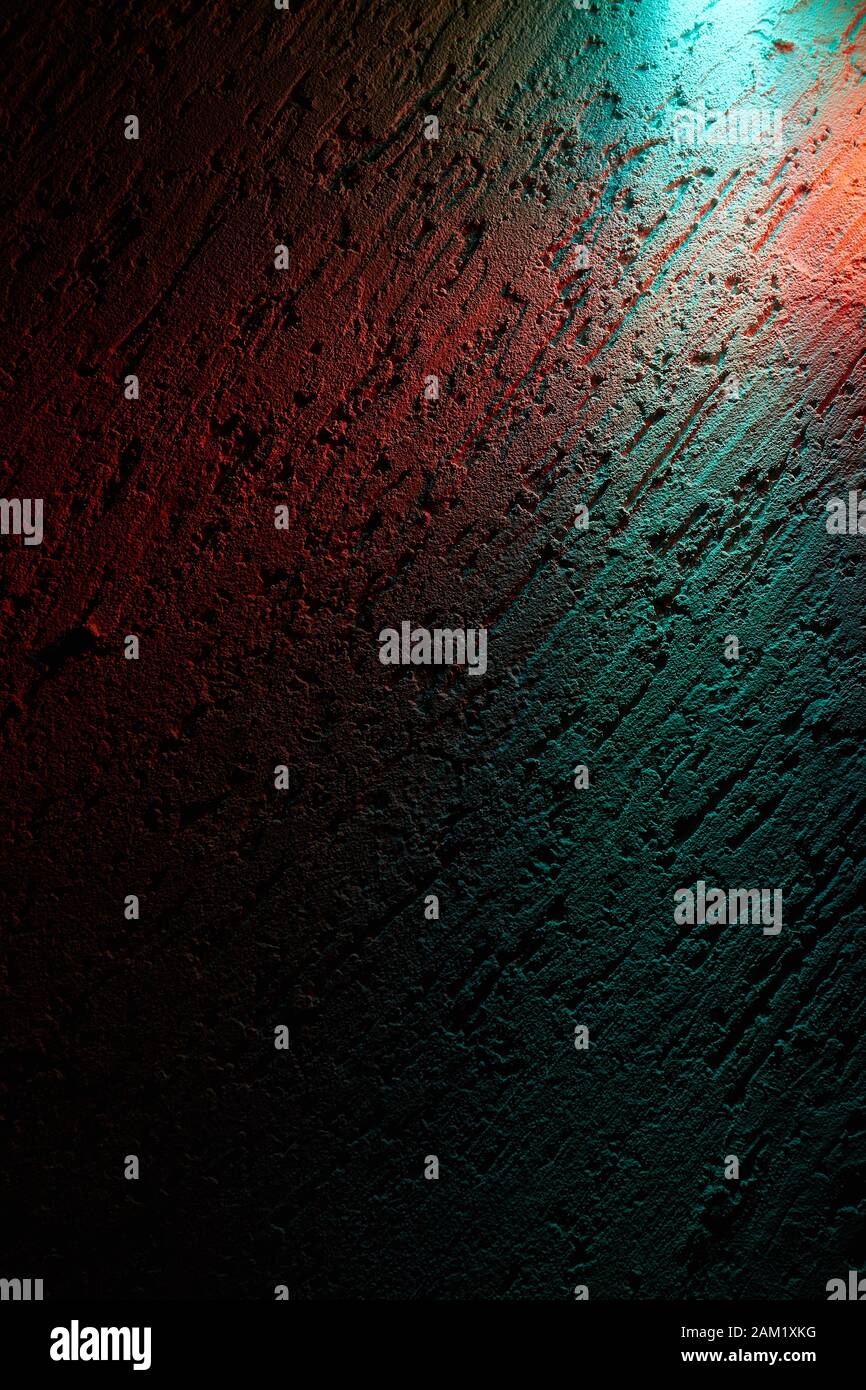 On a dark background the intersection of the rays of the and red Stock Photo