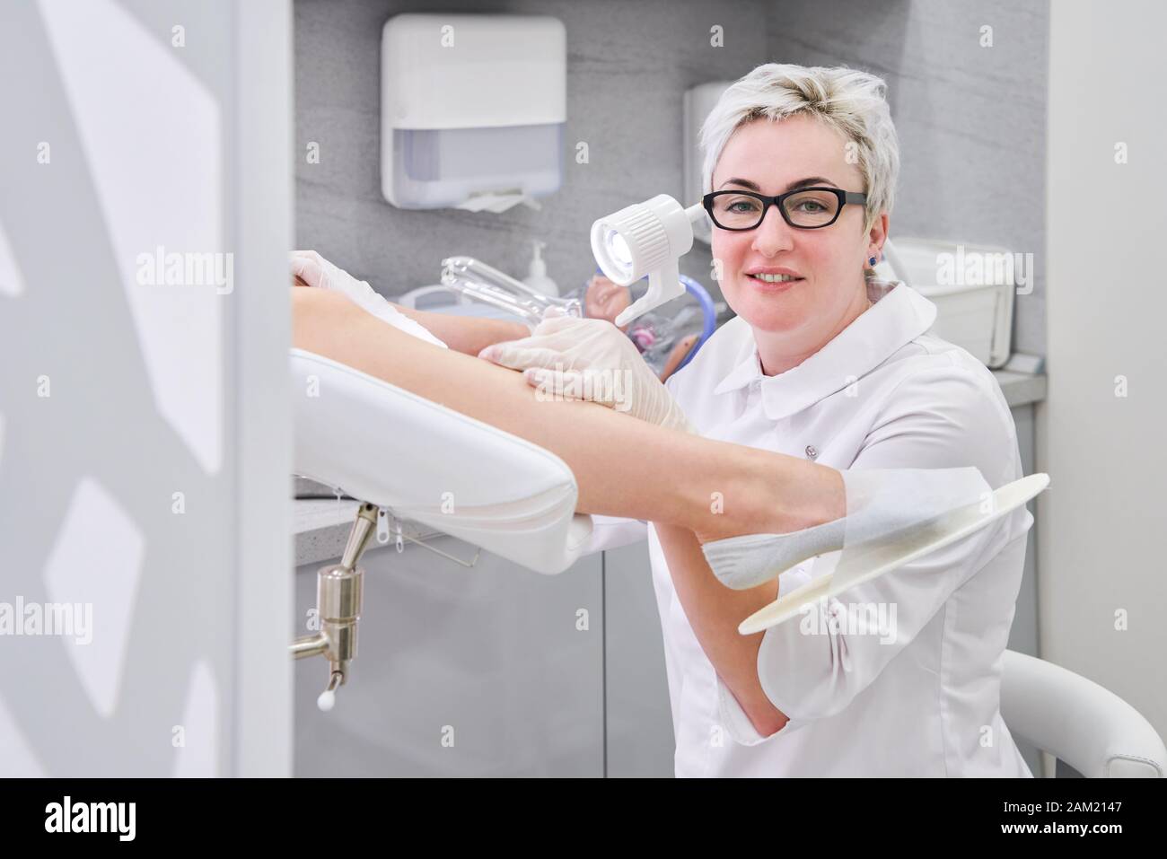 Female gynecologist with vaginal speculum in clinic Stock Photo Alamy