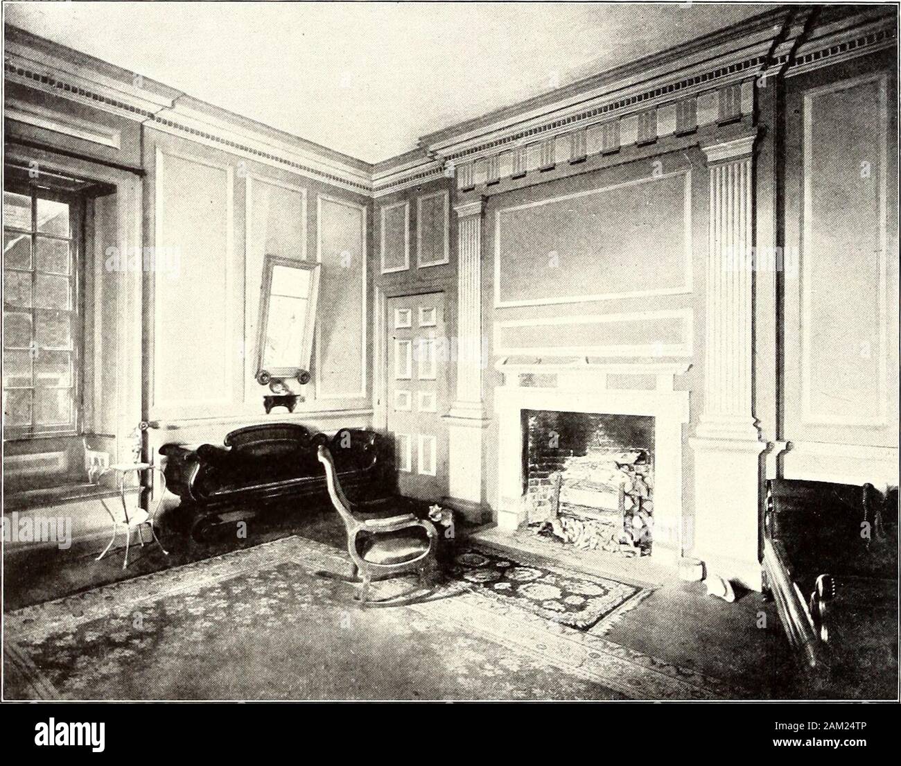 Domestic architecture of the American colonies and of the early republic . AMERICAN DOMESTIC ARCHITECTURE Tuckahoe (figure 83), Westover (figure 102), the Hancock house, and many laterhouses, rising sometimes from the floor, sometimes from the dado. In the hall atStratford (figure 84) they are used more ambitiously, completely surrounding theroom at intervals measurably regular in effect, though not perfectly equal. A simi-lar treatment, with Ionic pilasters, is found in the drawing-room from Marmion(figure 85), now in the Metropolitan Museum, and was apparently used likewise. From a photograp Stock Photo